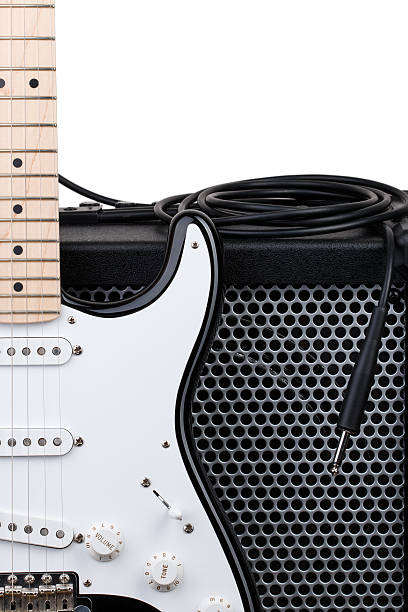 istock Guitar with amplifier and audio cord 542581350