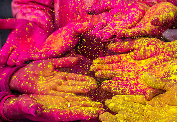 istock Colorful Hands celebrating Holi festival 542582110