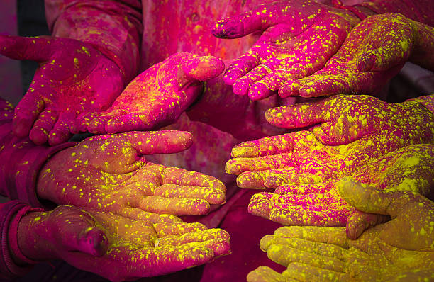 istock Colorful Hands celebrating Holi festival 542582122