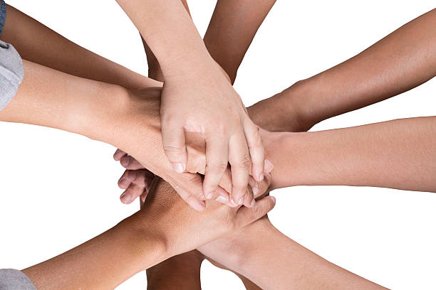 istock people put hand together isolated on white background 542584406