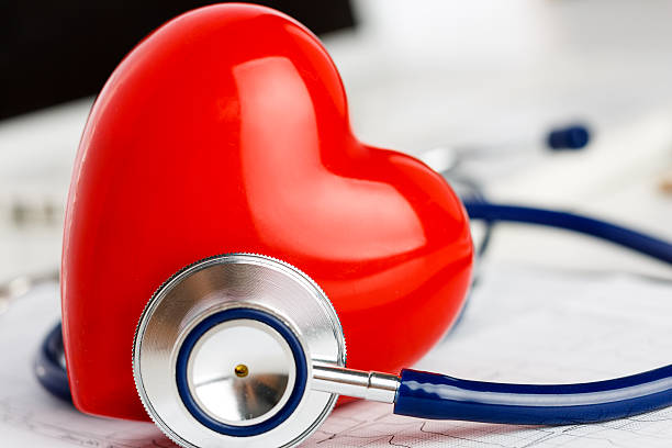 istock Medical stethoscope head and red toy heart 542585828