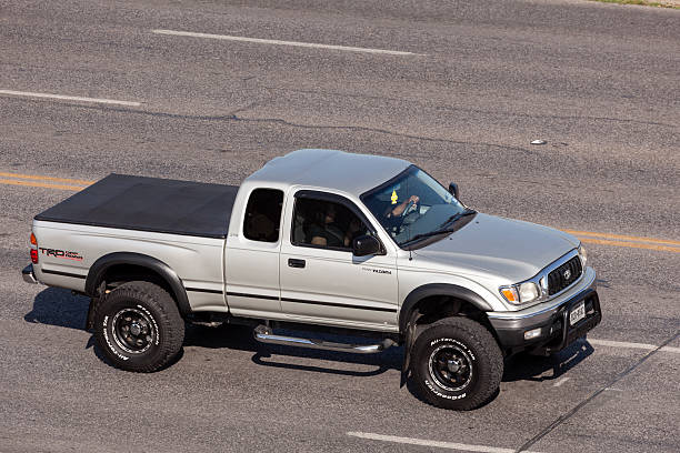 Toyota Tacoma TRD pickup truck Austin, TX, USA - April 11, 2016: Toyota Tacoma TRD off road pickup truck on the street in Austin. Texas, United States tacoma stock pictures, royalty-free photos & images