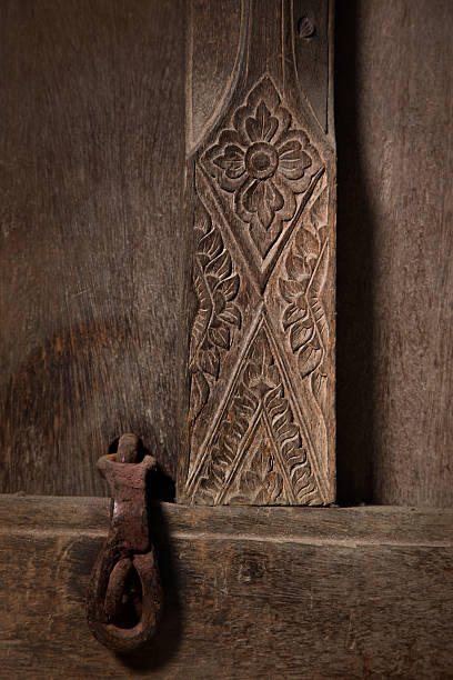 istock carve door and padlock in ancient thai house 542587700