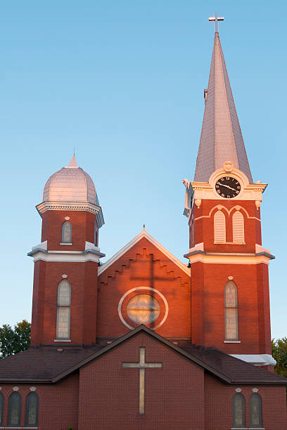 istock Miracle; shadow of telephone pole makes crucifix on church. 542587984