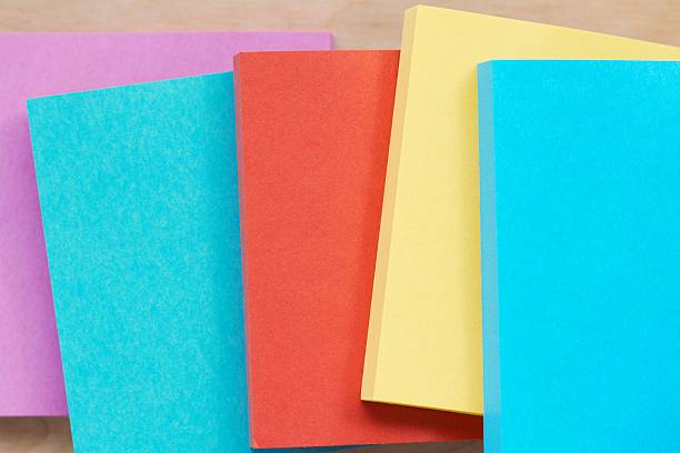 istock Macro of colorful sticky note pads office or school supply 542588234