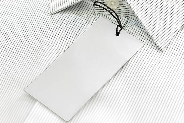 istock Formal white male shirt with empty tag 542588598