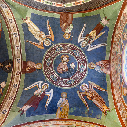 Subiaco, Lazio, Italy: in the St. Benedict's monastery - the lower church - the vault is decorated with the Symbols of the Four Evangelists and Four Cherubs. In the mid, Jesus Christ blessingThis fresco was depicted in the half of the 13th cent.