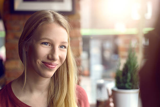 istock Happy young woman with a beaming smile 542685654