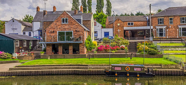 evesham - grass church flood landscape imagens e fotografias de stock