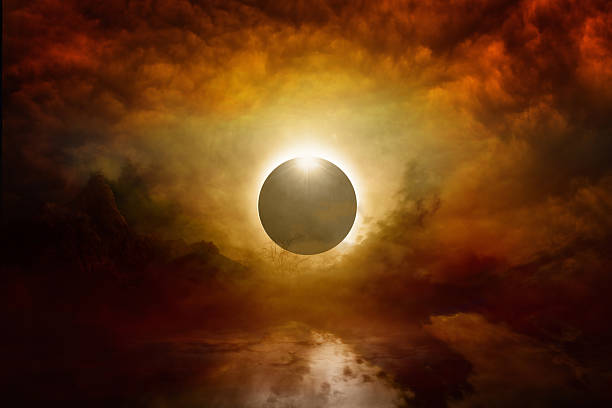 istock Full sun eclipse in dark red sky, end of world 542688122