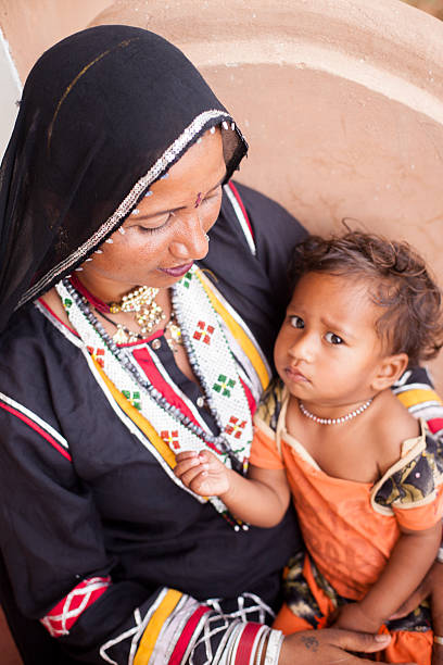 istock Young Indian Mother with her infant son 542690570