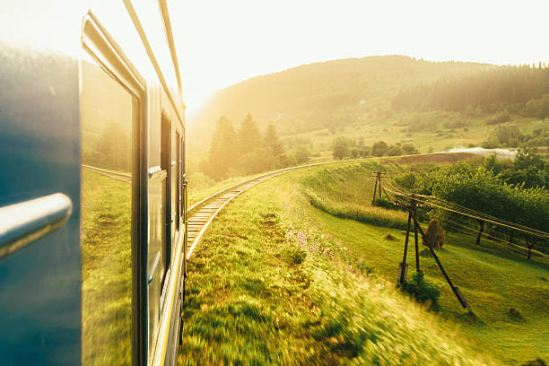 View from train View from train on mountains at sunset  ukrainian village stock pictures, royalty-free photos & images