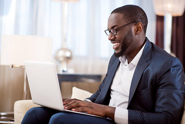 istock Profile of man working on laptop 542694206
