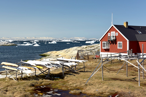 icebergs are on the arctic ocean in ilulissat, Greenland, there are some sledge ski