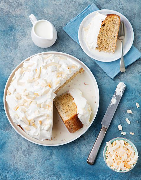 Three milk cake, tres leches cake with coconut. Top view