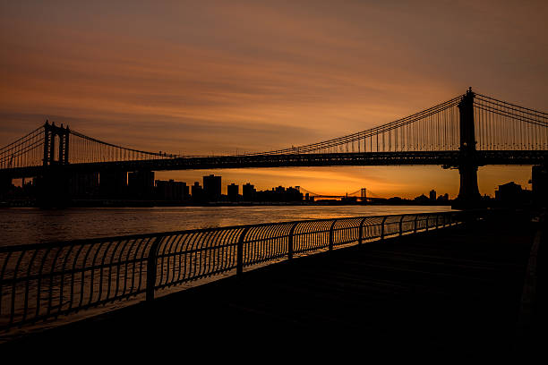 istock Brooklyn Bridge Silhouette and boardwalk 542696684