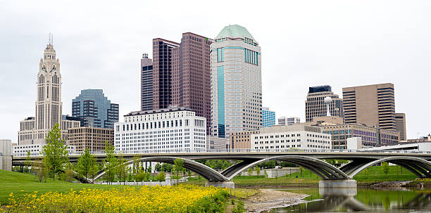 istock Columbus Ohio skyline with bridge and reflection 542696758