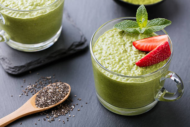 istock Matcha green tea chia seed pudding, dessert with strawberry 542697120