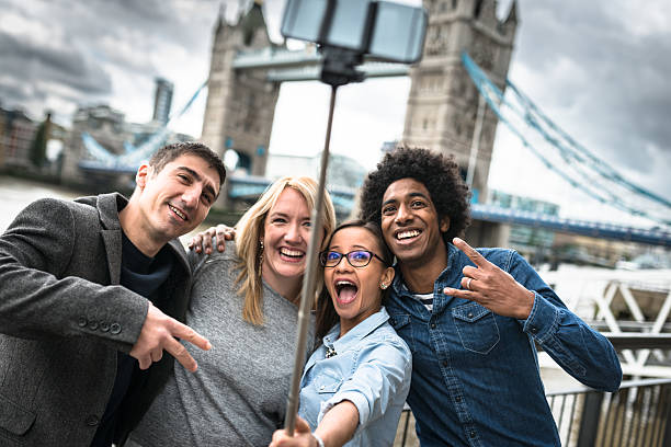 istock friends take a selfie in london - Tower bridge 542697784