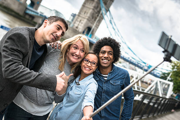 istock friends take a selfie in london - Tower bridge 542697826