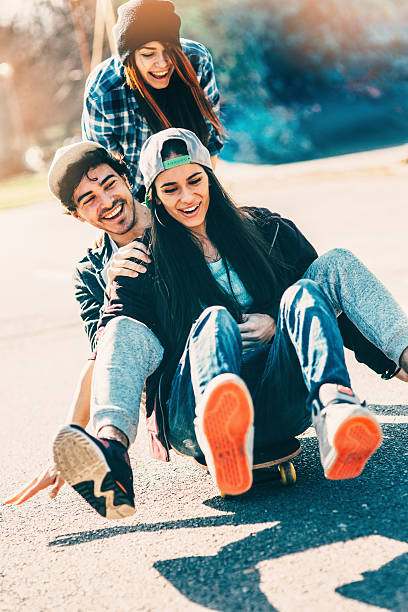 istock Friends on a skateboard 542700056