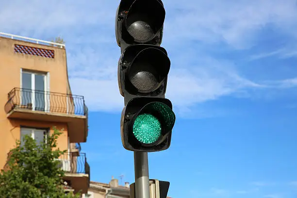 Close Up of Green Illuminated on Traffic Light