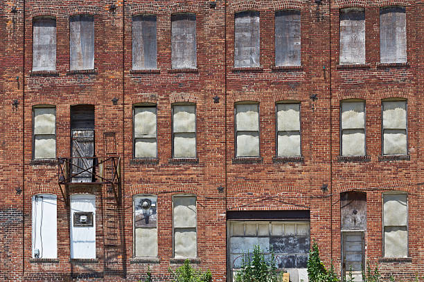 istock Abandoned Automotive Factory - Worn, Broken and Forgotten III 542700512