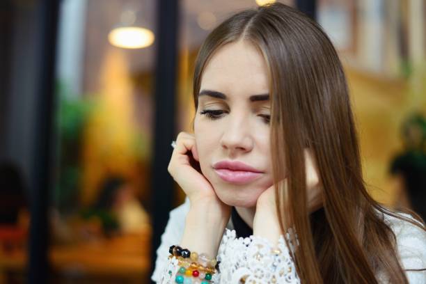 istock Sad young woman 542701646
