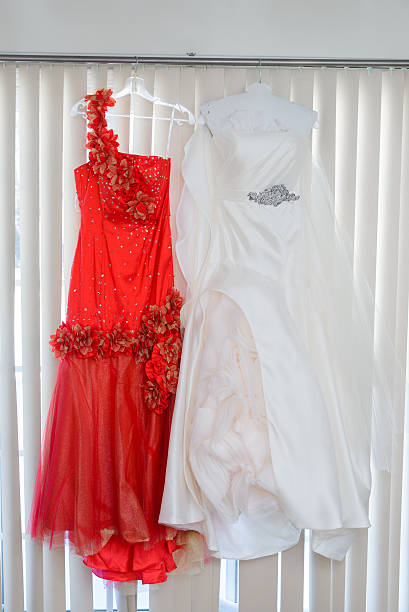 istock three wedding bouquets being held by a bride and her 542702000