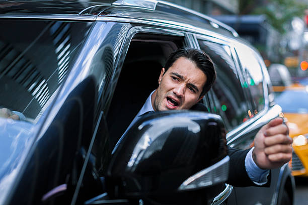 Angry driver in city traffic stock photo