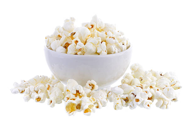 istock popcorn in bowl isolated on white background 542705360