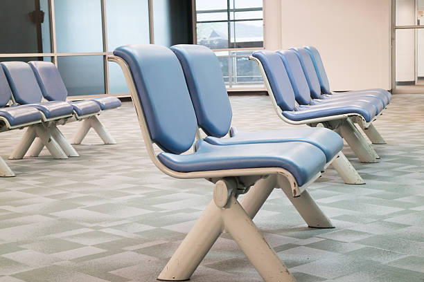 istock Row of leather waiting chairs 542705468