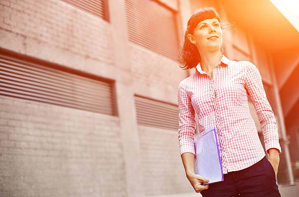 istock woman with phone 542707112