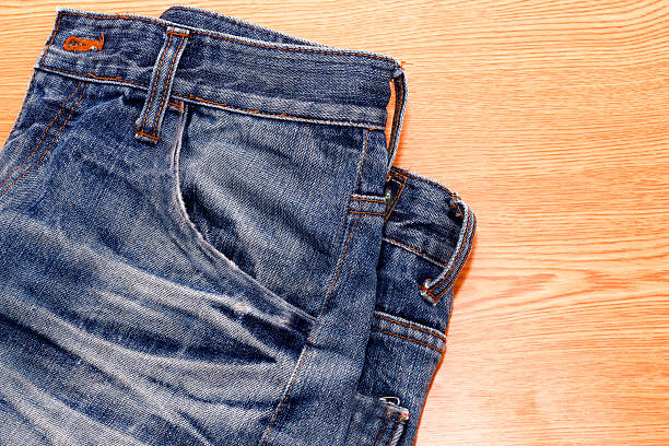 istock blue jean, blue denim on wooden,desk 14 542709214