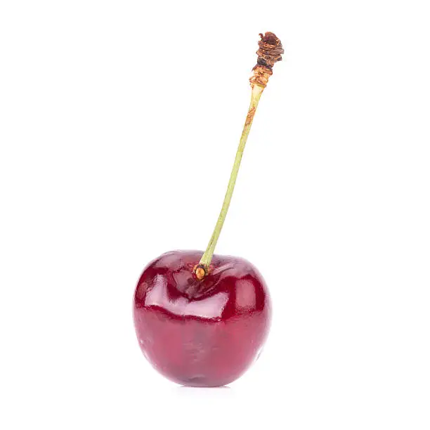 Sweet fresh cherry isolated on white background.