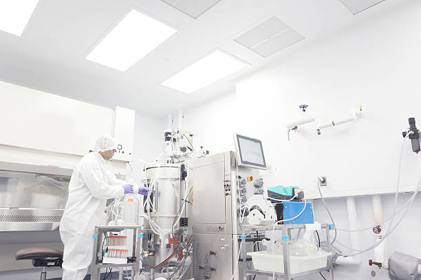 Scientist in a clean room stock photo