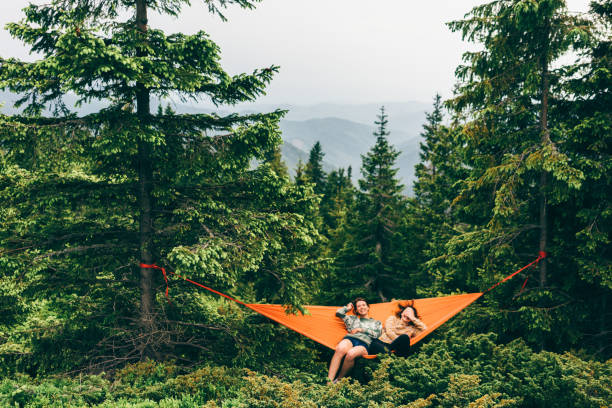 Two girls in hammock