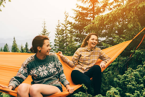 istock Two girl in hammock 542712472