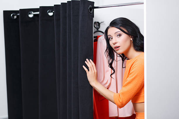 istock The young woman is dressed in a fitting shop 542712860