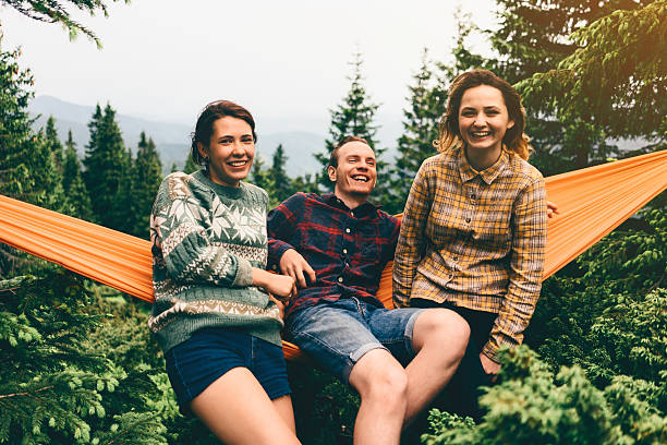 istock Friends in hammock 542713386