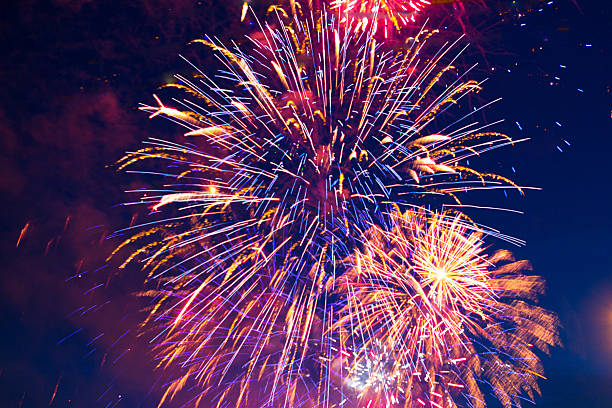 istock colorful fireworks on the black sky background 542714314