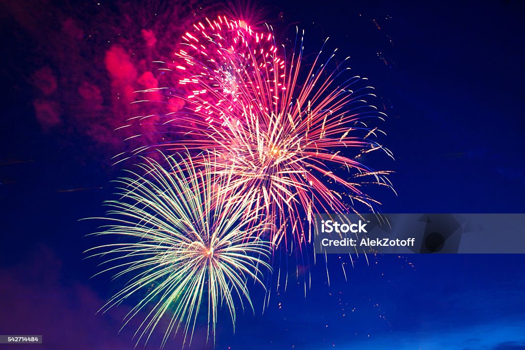 Fireworks 4th July 4th July fireworks. Fireworks display on dark sky background. Firework - Explosive Material Stock Photo