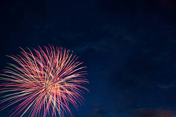 istock Brightly colorful fireworks and salute in the night 542715850