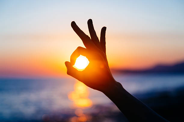 istock Ok hand sign silhouette at sunset 542716964