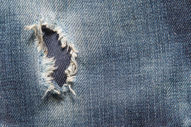 istock Striped textured blue used jeans denim linen vintage background 542719198