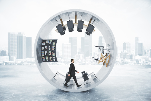 Abstract office interior with businessman inside concrete cylinder on foggy city background. 3D Rendering