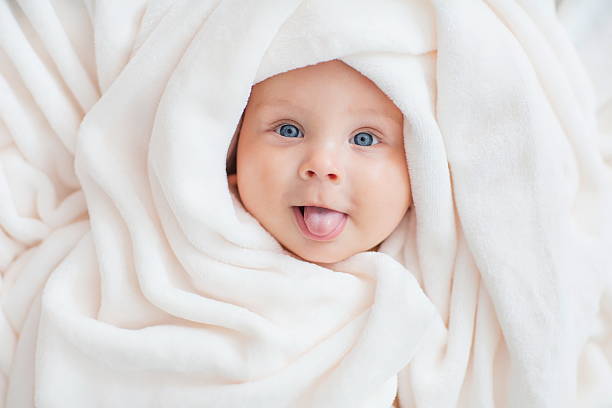 Bébé avec une serviette - Photo