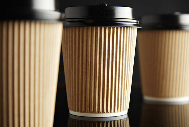 istock Brown luxury take away paper cups set black mirrored 542727096