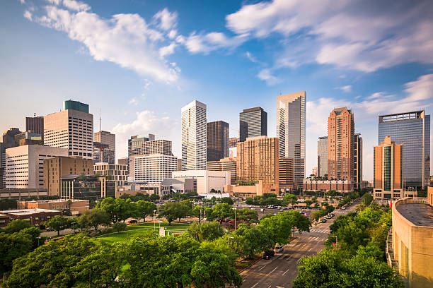 Houston Texas Skyline Houston, Texas, USA downtown city park and skyline. downtown district stock pictures, royalty-free photos & images