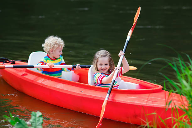 istock Kids kayaking in summer sport camp 542728350